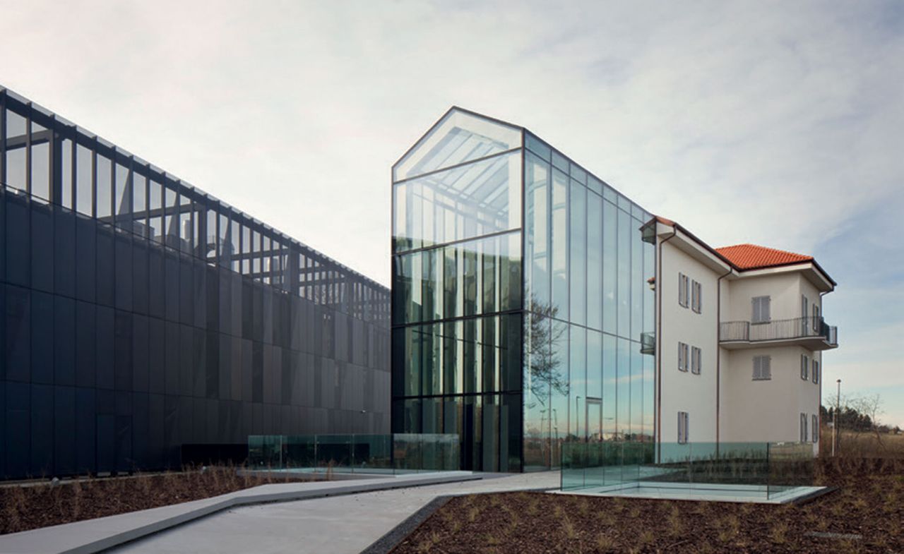 three-storey building, featuring an internal courtyard