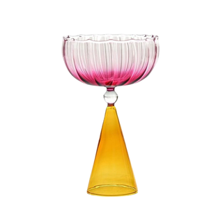 coupe glass with a triangular shaped base in shades of pink and orange