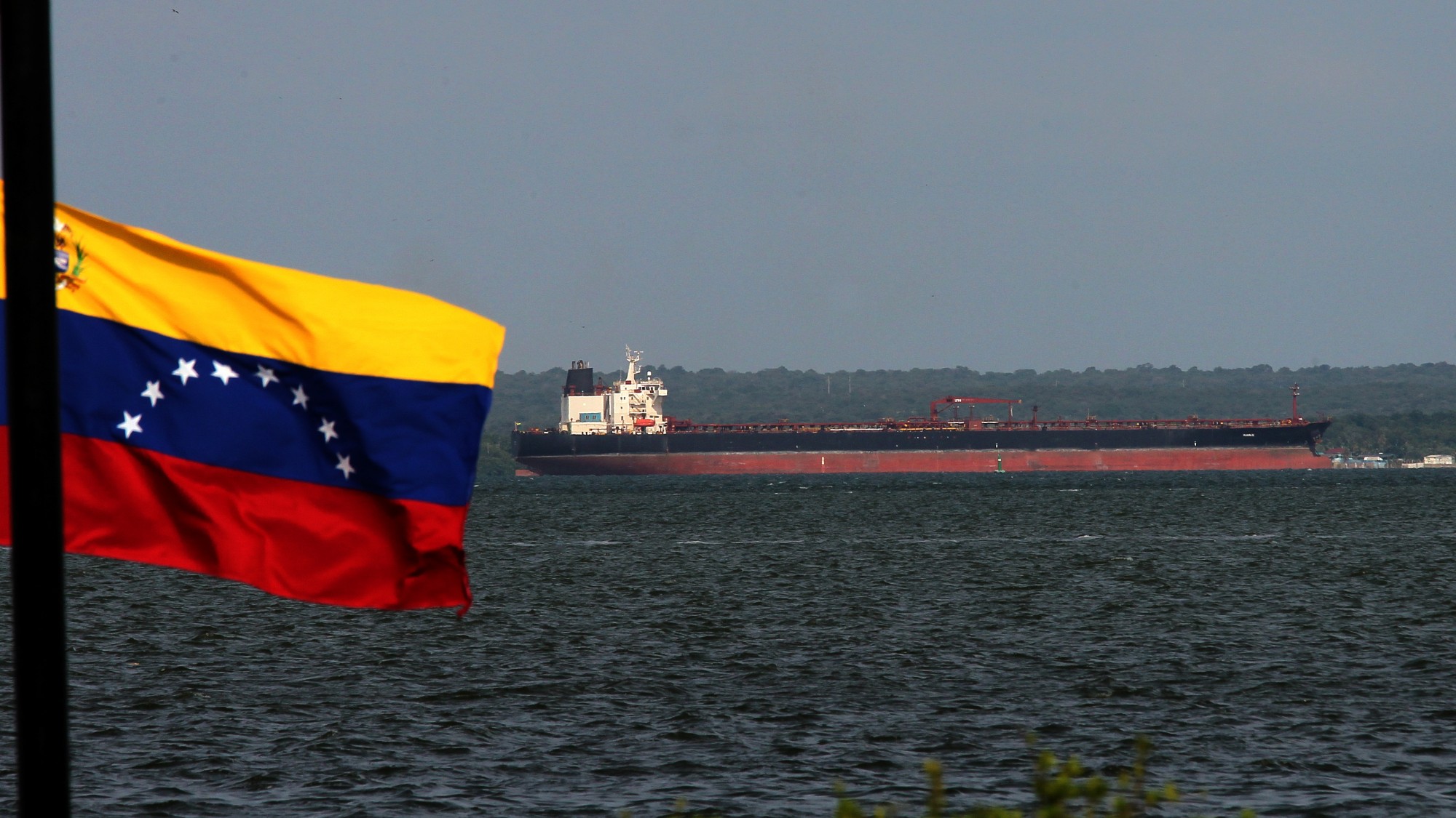 Crude oil tankers are docked and loaded at the Bajo Grande oil terminal on Lake Maracaibo in Venezuela