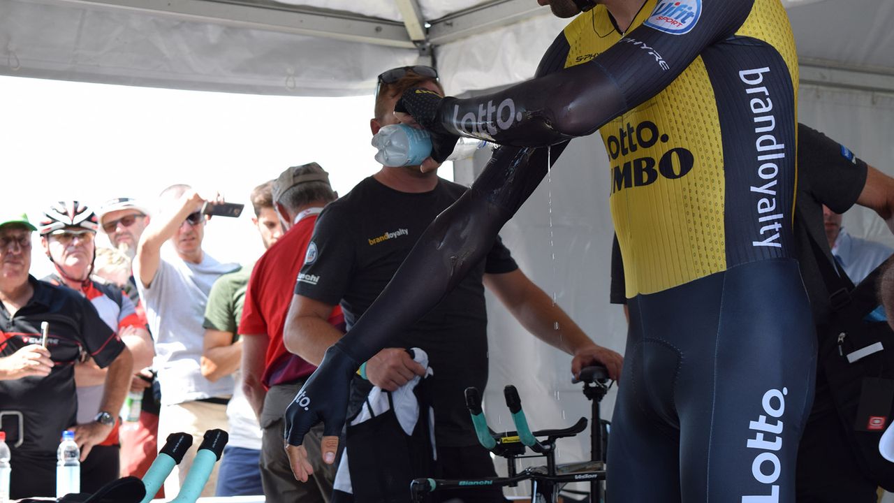 A handful of riders poured water over their speedsuits at the start in an attempt to stay cool in the warm temperatures