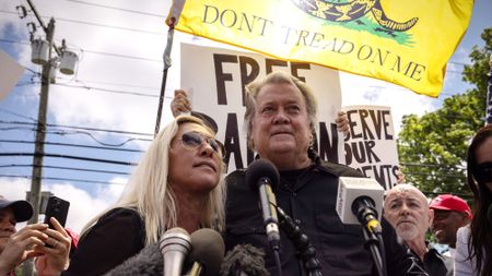 Steve Bannon and Rep. Marjorie Taylor Greene (R-Ga.) before Bannon enters prison