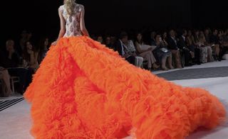 model with orange gown