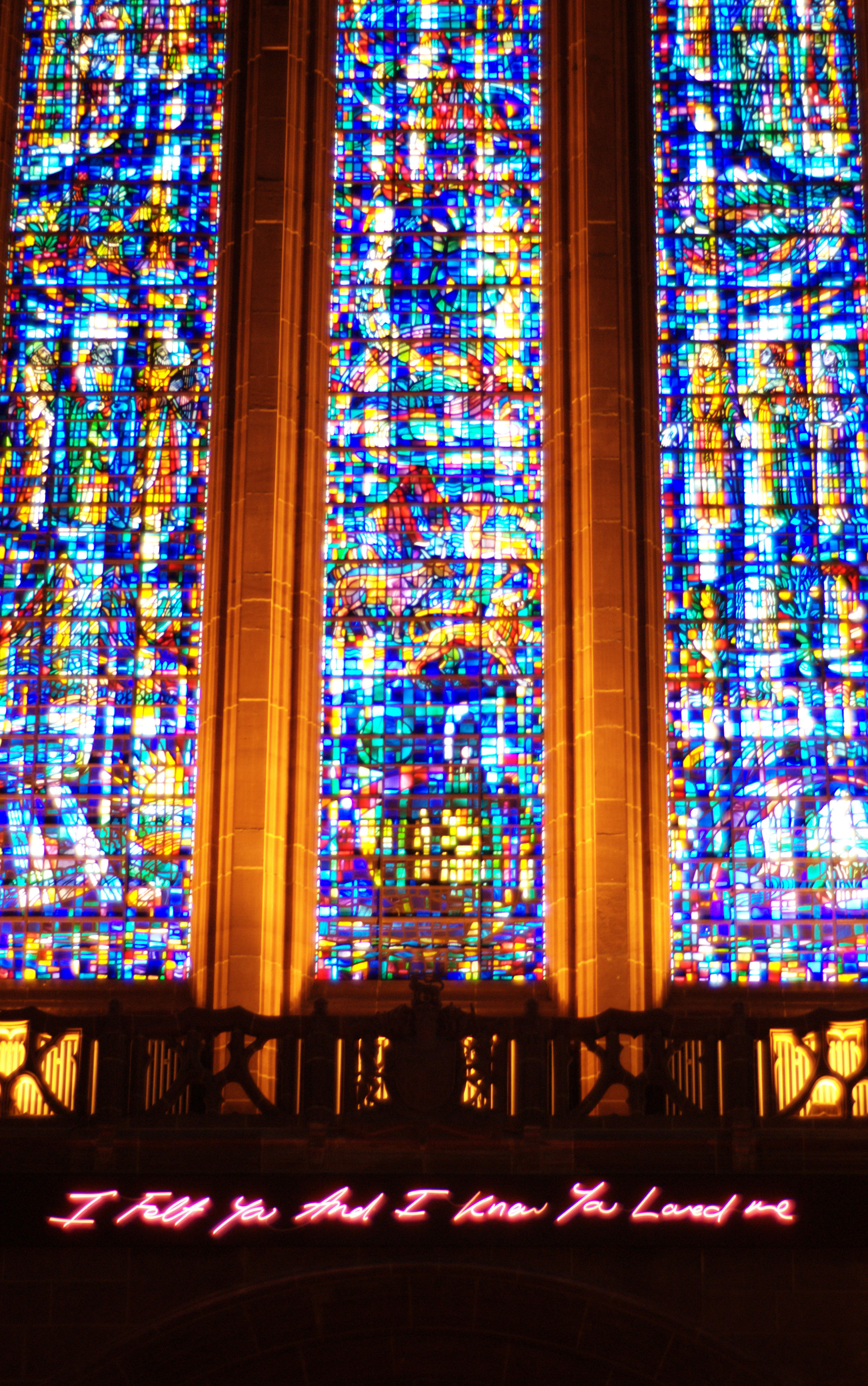 Tracey Emin's installation in Liverpool Anglican Cathedral reads 'I felt you and I know you loved me' in neon pink writing.
