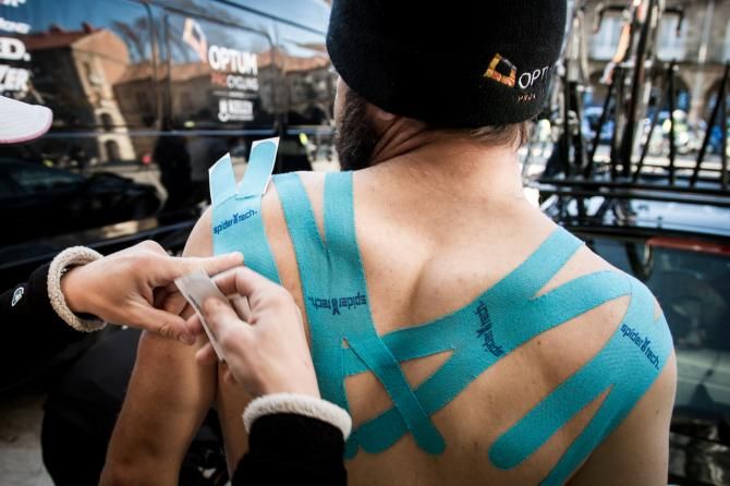 Mike Friedman gets his SpiderTech tape applied pre-race
