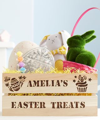 Personalized Easter crate filled with seasonal goodies.