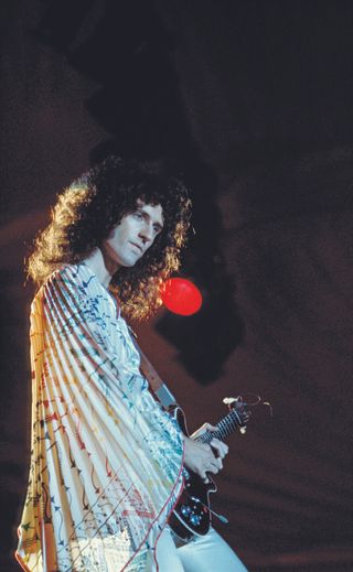 Queen’s Brian May plays his homemade “Red Special” at London’s Hyde Park in September 1976.