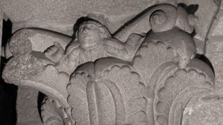 An unknown stonemason carved a self-portrait into the top of a pillar in the Santiago de Compostela Cathedral.