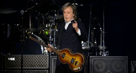 Paul McCartney plays a H&ouml;fner 500/1 bass guitar live onstage and points to the crowd during his 2024 Got Back Tour