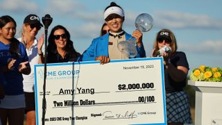 Amy Yang with her cheque after winning the 2023 CME Champisonship
