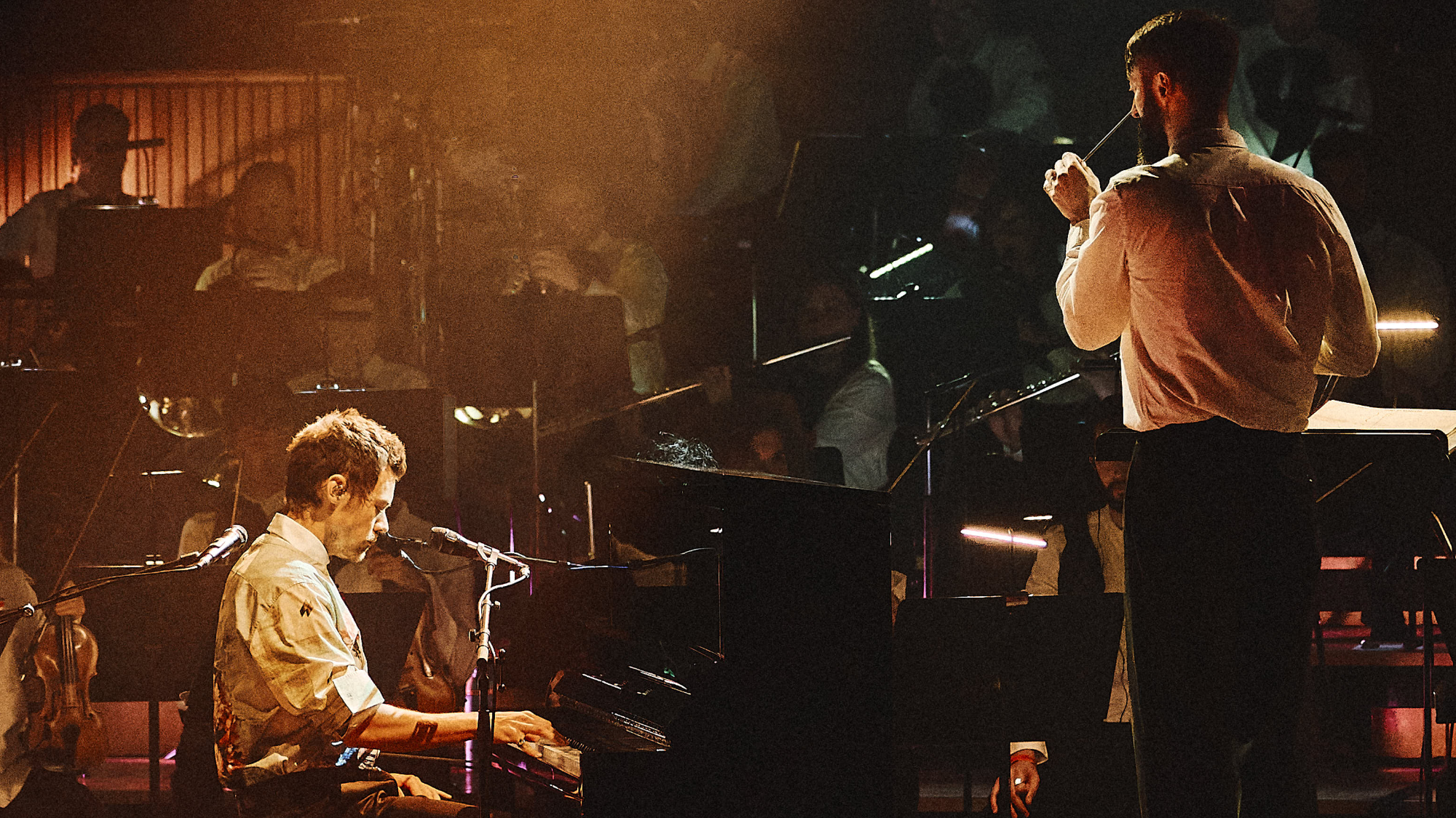 Harry Styles plays piano with the Jules Buckley orchestra