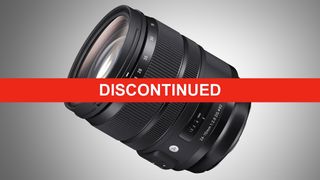 Camera lens with a red "DISCONTINUED" banner across it, indicating the product is no longer available