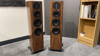 Wharfedale Aura 3 floorstanding speakers in test room next to bookshelf