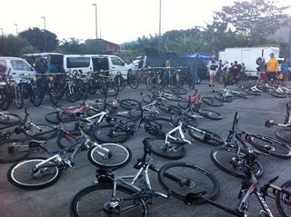 Bikes await their riders at the start of stage 2