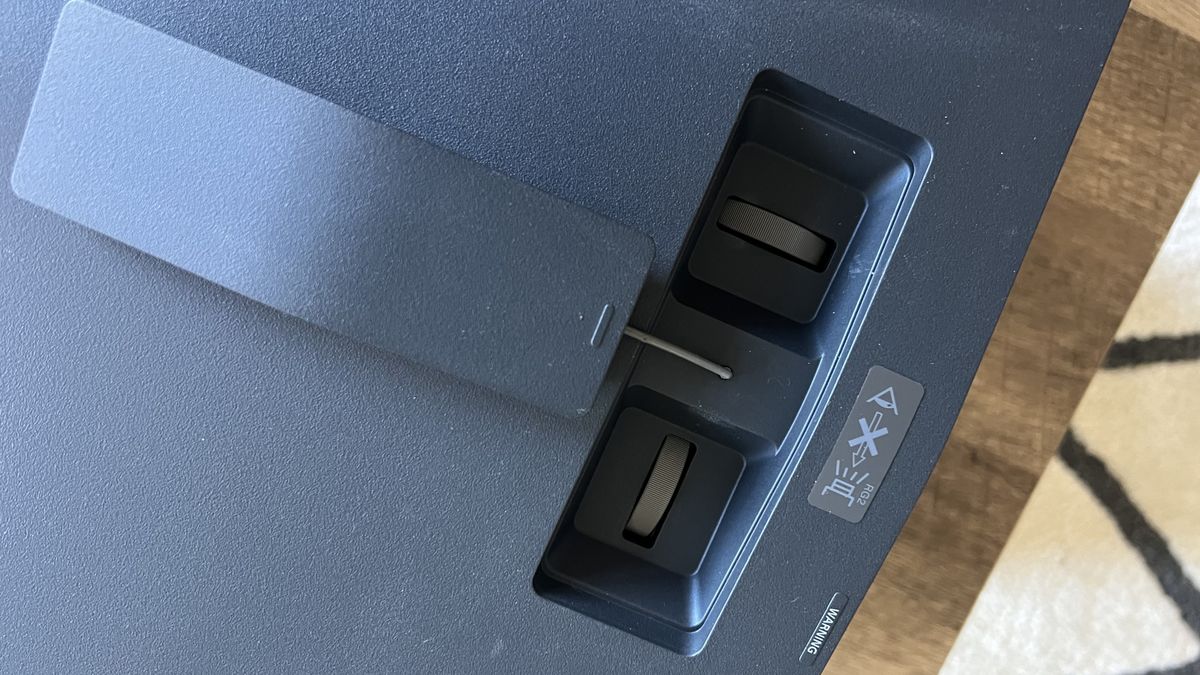 Close up on manual lens shift controls on Sony Bravia Projector 7