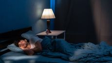 A man sleeping in bed 