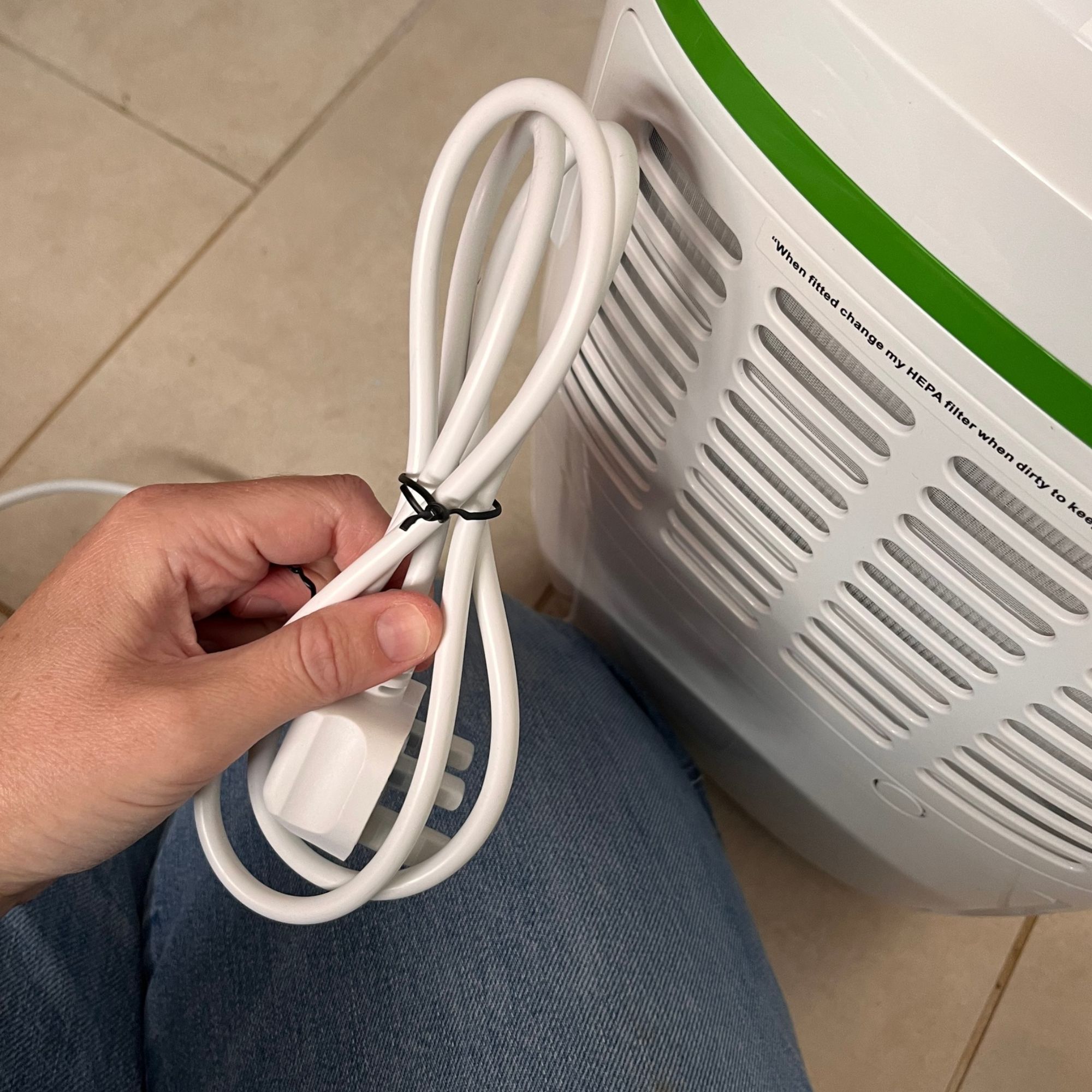 meaco 12l low energy dehumidifier cable tie being removed after delivery