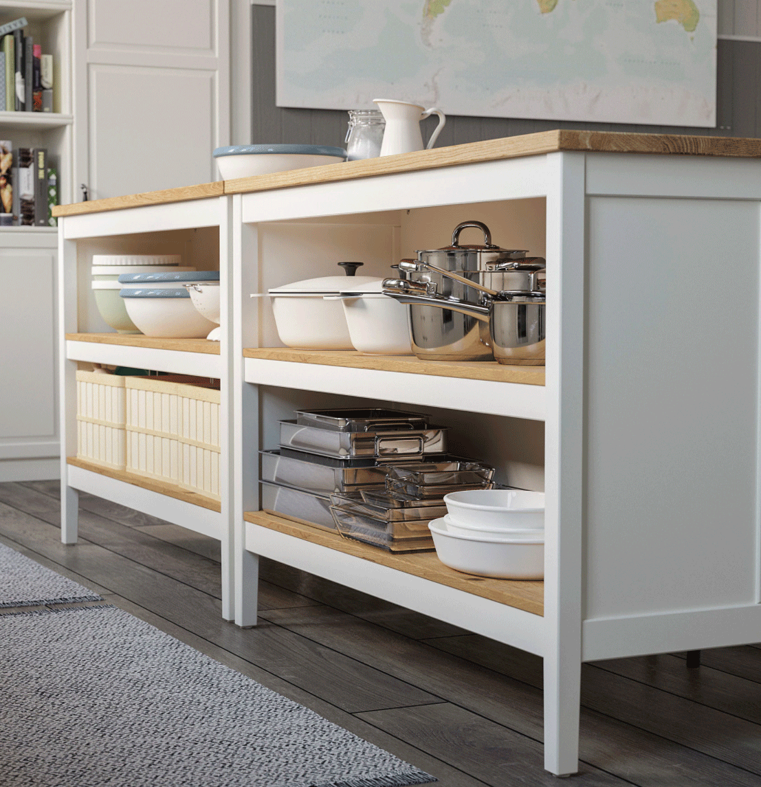An example of portable kitchen island ideas showing a white portable island with open shelving for crockery and pans