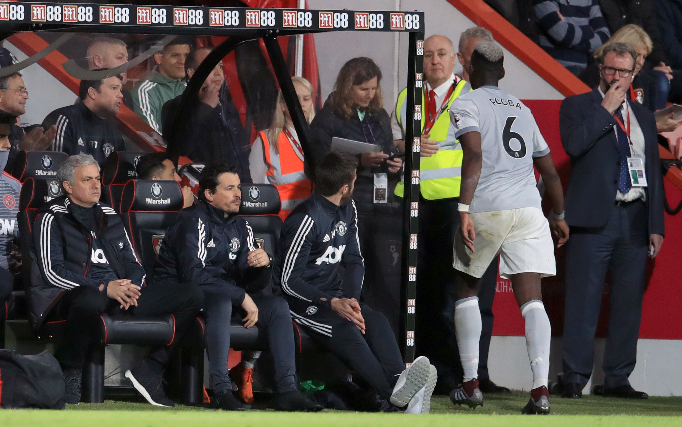 Paul Pogba, right, clashed with Jose Mourinho, left