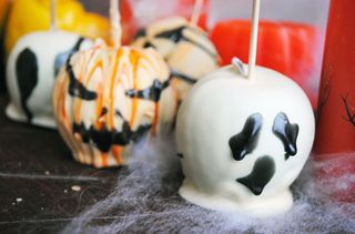 Spooky chocolate-covered apples