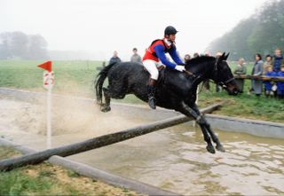 Prince Charles competing in a cross country event in Cirencester, He is riding a horse called Candlewick