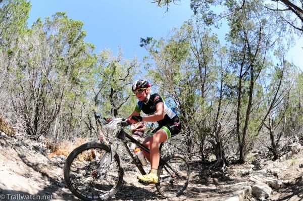 A rider on singletrack littered with rocks