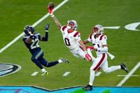 SANTA CLARA, CALIFORNIA - FEBRUARY 08: Christian Gonzalez #0 of the New England Patriots breaks up a pass intended for for Rashid Shaheed #22 of the Seattle Seahawks during the second quarter in Super Bowl LX at Levi's Stadium on February 08, 2026 in Santa Clara, California. (Photo by Thearon W. Henderson/Getty Images)