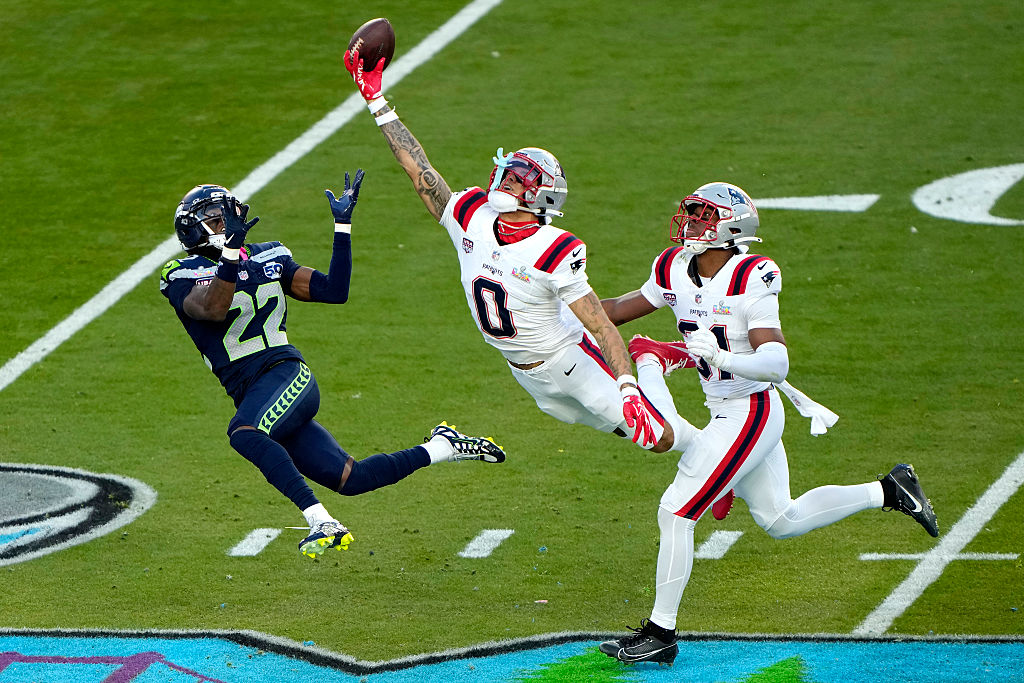 SANTA CLARA, CALIFORNIA - FEBRUARY 08: Christian Gonzalez #0 of the New England Patriots breaks up a pass intended for for Rashid Shaheed #22 of the Seattle Seahawks during the second quarter in Super Bowl LX at Levi&amp;apos;s Stadium on February 08, 2026 in Santa Clara, California. (Photo by Thearon W. Henderson/Getty Images)