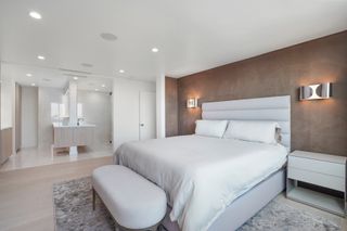 Modern neutral master bedroom in Joe Elliott's Hollywood apartment