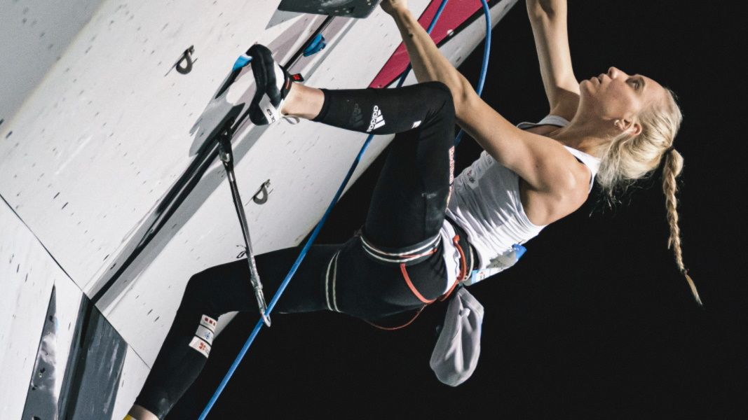 Janja Garnbret climbing a wall