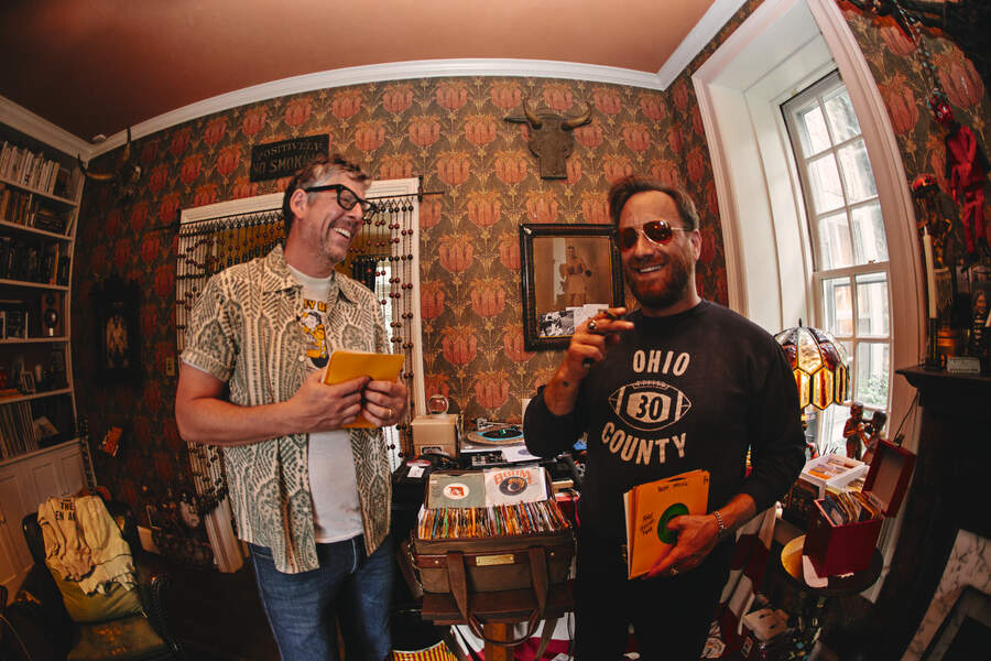 The Black Keys in a junk shop looking at 7&quot; singles