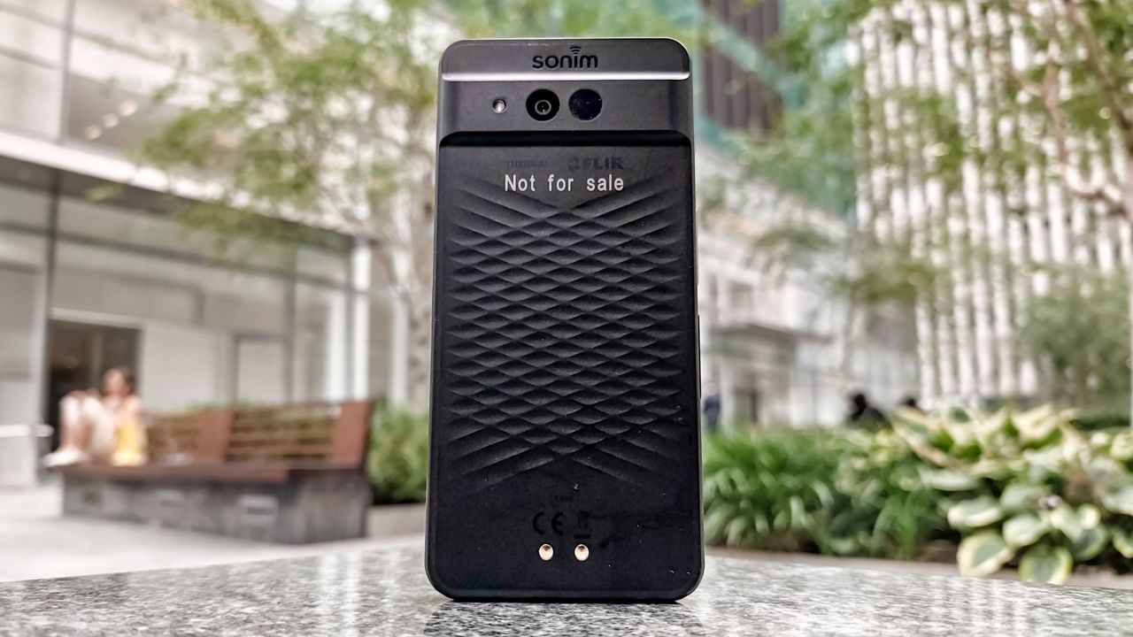 Sonim XP Pro Thermal held in the hand.