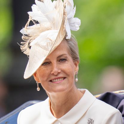 Duchess Sophie wears a cream white Roland Mouret dress, a designer loved by Princess Kate and Meghan Markle, with a matching hat