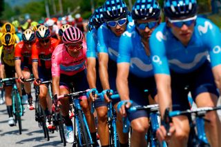 Richard Carapaz rides behind his 2019 Movistar teammates