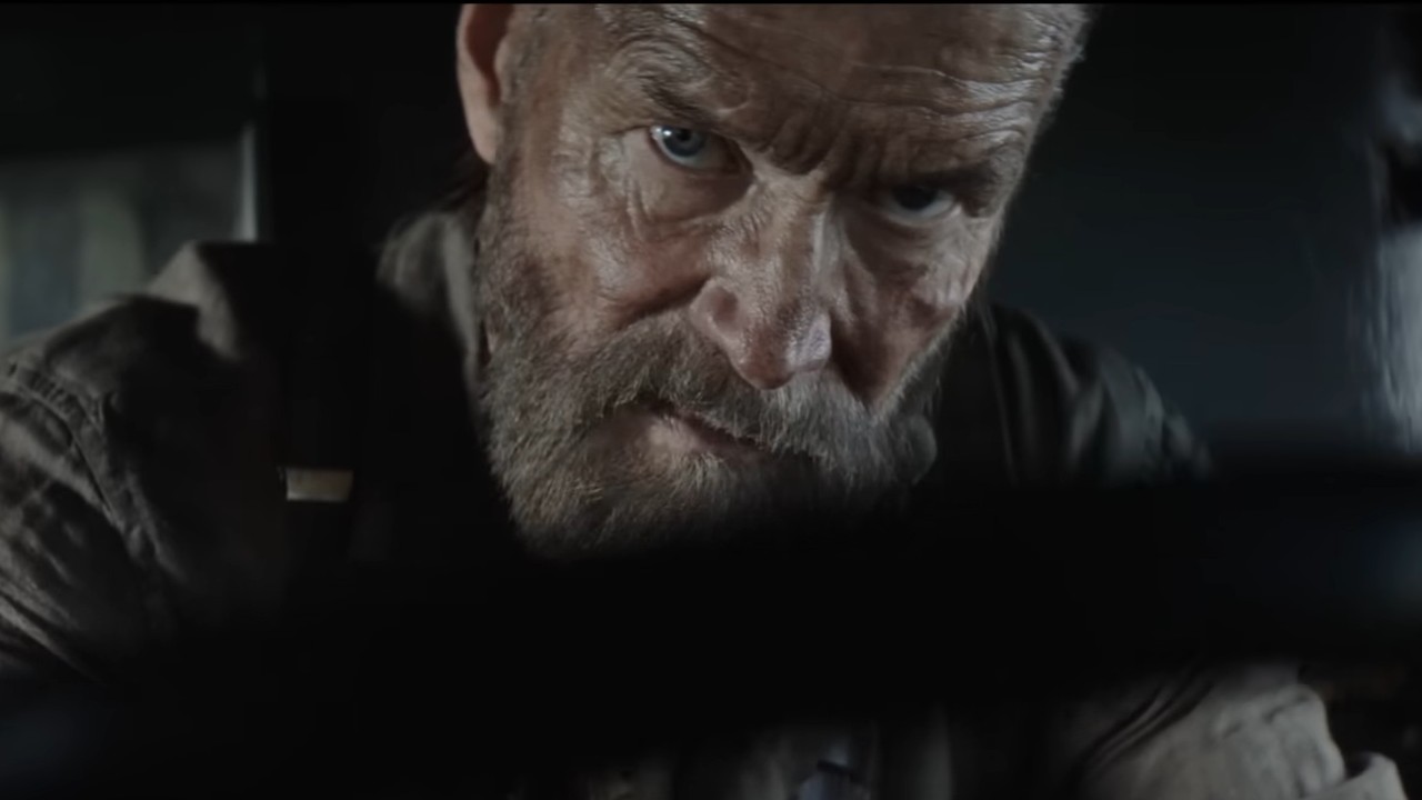 Jorma Tommila behind the steering wheel in Sisu: Road to Revenge