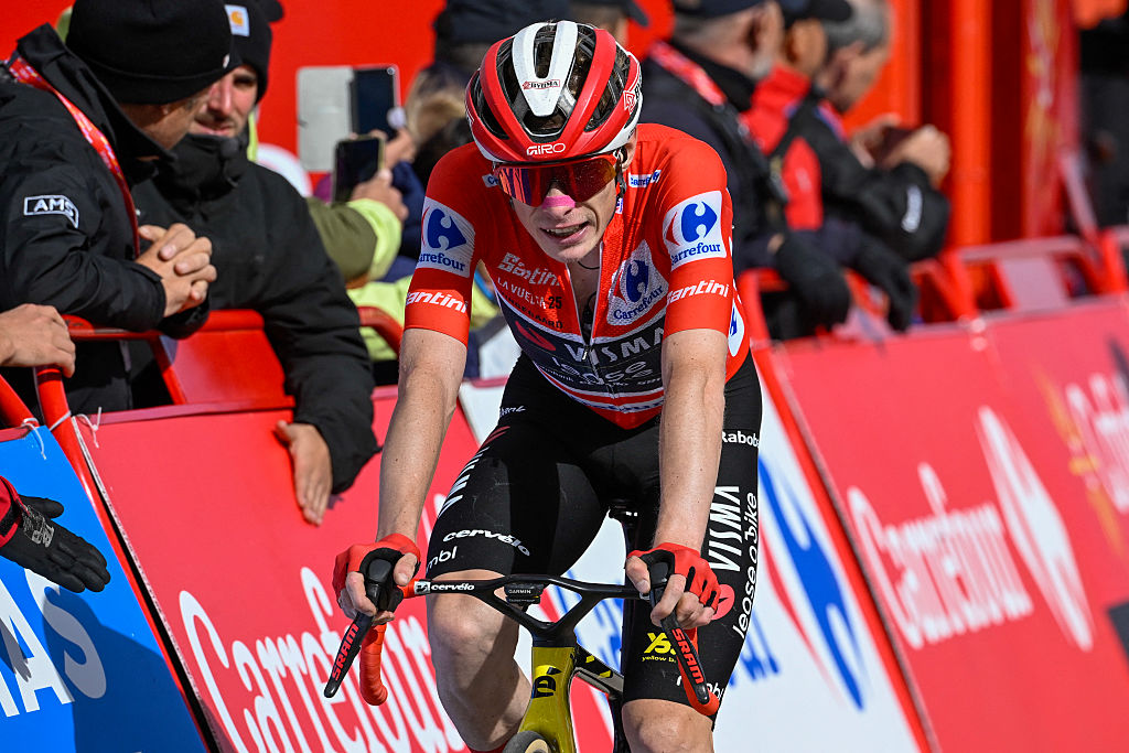 Overall race leader Team Visma-Lease a bike's Danish rider Jonas Vingegaard crosses the finish line of the 17th stage of the Vuelta a Espana, a 143 km race between O Barco de Valdeorras and Alto de El Morredero, Ponferrada, on September 10, 2025. (Photo by Miguel RIOPA / AFP)