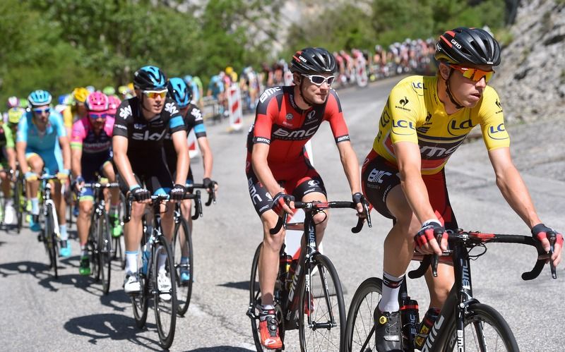 Tejay van Garderen sits on the wheel of teammate Rohan Dennis during the stage