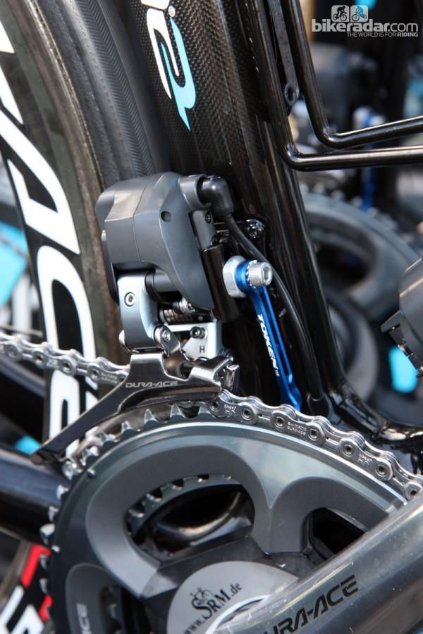 Shimano Dura-Ace Di2's front shift performance is amazing but cobbles are cobbles. Sky team mechanics lend a little extra insurance to Edvald Boasson Hagen's Pinarello Dogma 2 with this chain keeper from Token.