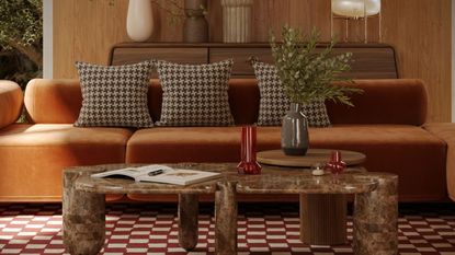 Living room with mid century accents including rounded stone table, orange sofa and rounded wooden cabinet