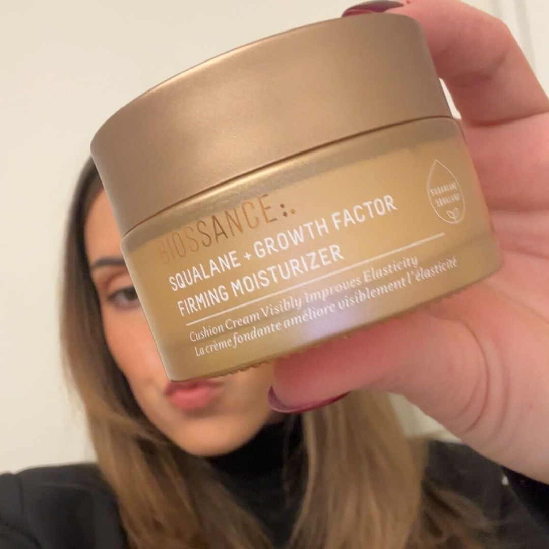 Christina DAmbrosio holding the new Biossance Squalane + Growth Factor Firming Moisturizer.