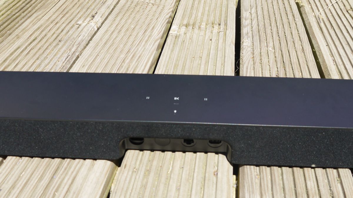 The top of the Sonos Beam soundbar on a wooden surface
