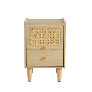 A bedside table with rattan detail