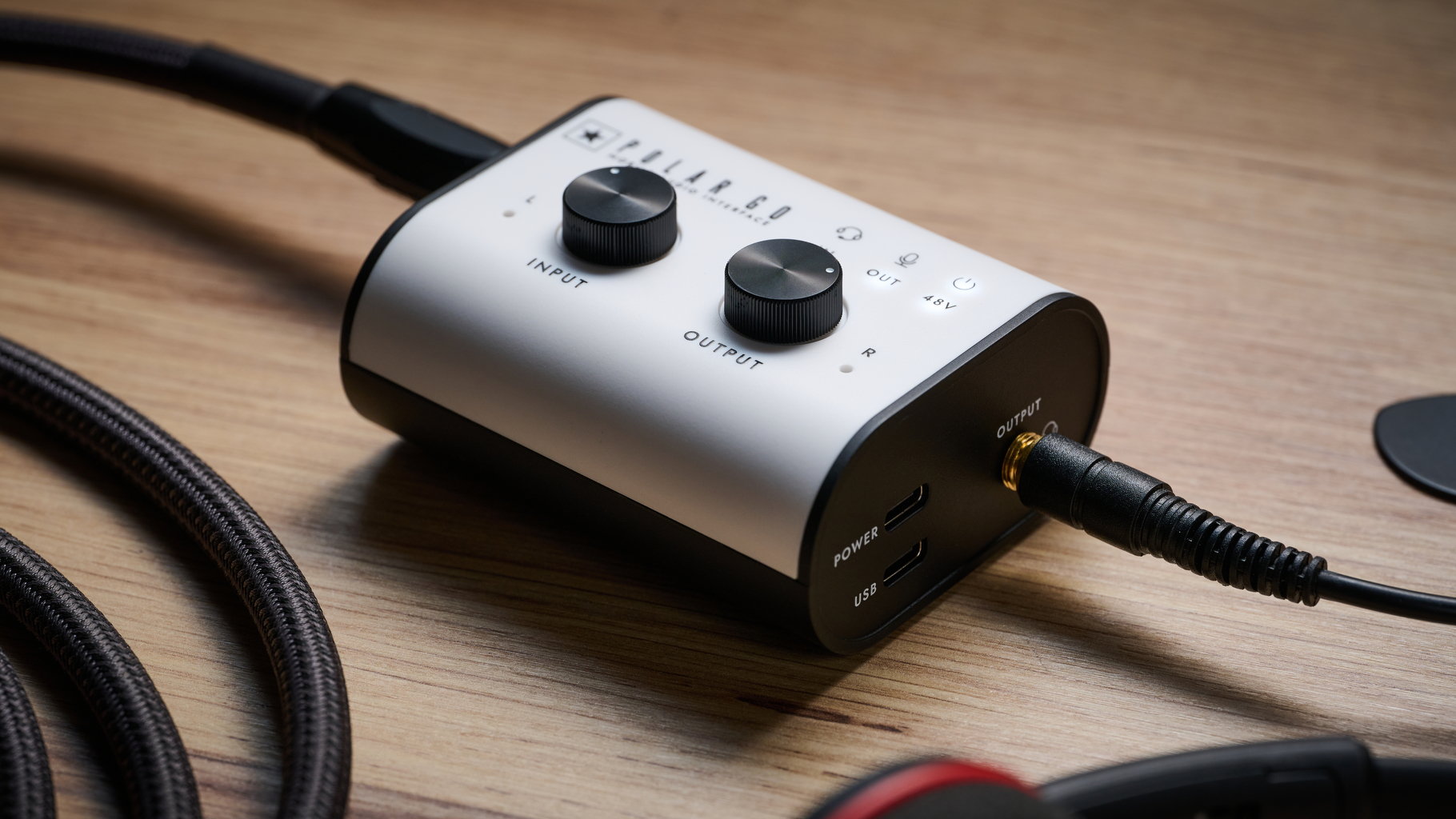 A Blackstar Polar Go audio interface on a wooden desk