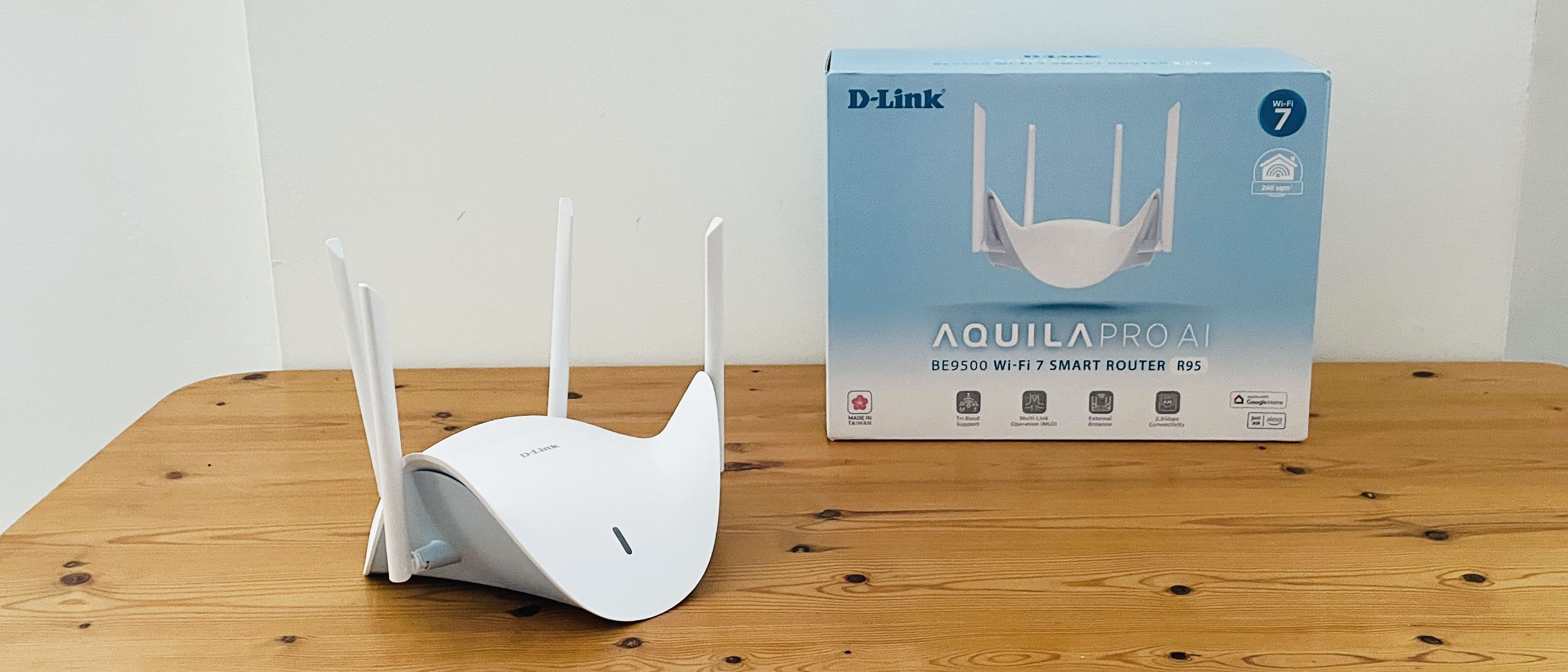 D-Link Aquila Pro AI R95 on wooden table