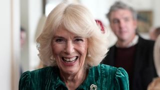 Queen Camilla arrives to decorate the Christmas tree and receive a few festive surprises at Clarence House