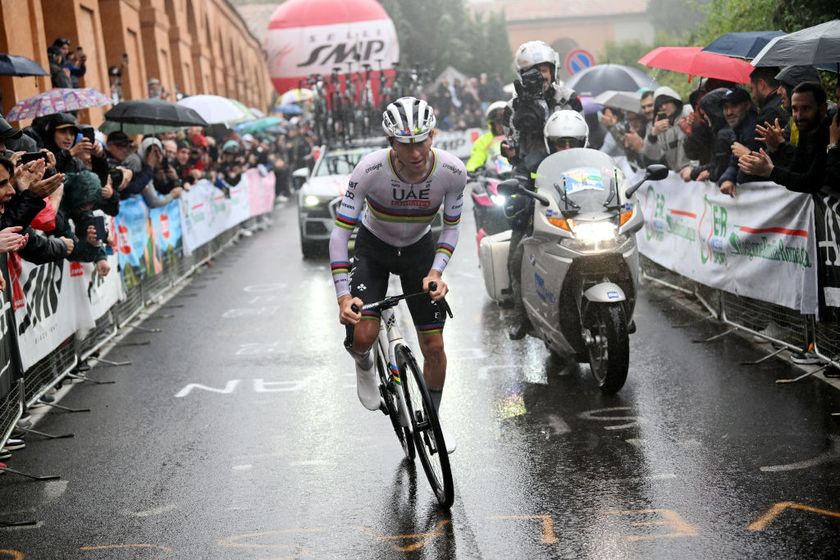 SAN LUCA, ITALY - OCTOBER 05: Tadej Pogacar of Slovenia and Team UAE Team Emirates competes in the breakaway climbing to the Sanctuary of Our Lady of San Luca during the 107th Giro dell&#039;Emilia 2024 a 215.3km one day race from Vignola to Bologna - San Luca 267m on October 05, 2024 in San Luca, Italy. (Photo by Dario Belingheri/Getty Images)