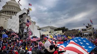 Donald Trump supporters clash with police and security forces as people try to storm the US Capitol on January 6, 2021 in Washington, DC.
