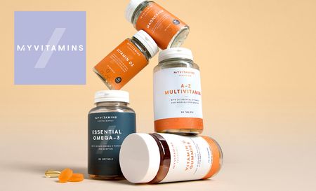 My vitamins logo to left with a pile of vitamins