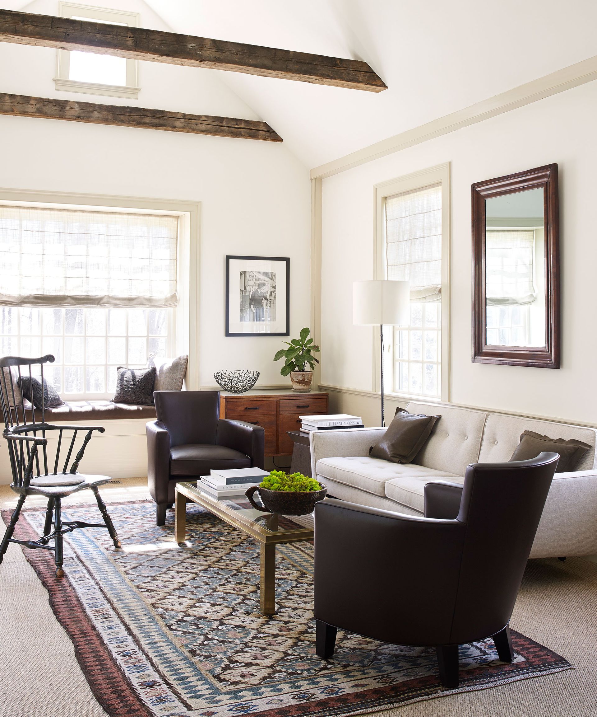 Living room seating ideas with dark wood and cream decor