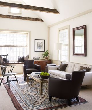 Living room seating ideas with dark wood and cream decor