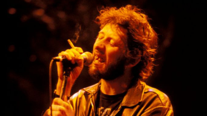 Shane MacGowan performs with The Pogues 